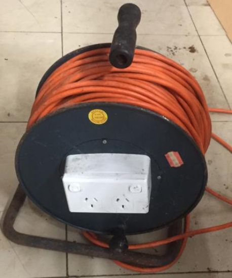 Picture of Power Extension Reel. Used. Estimated length 30-60 meters